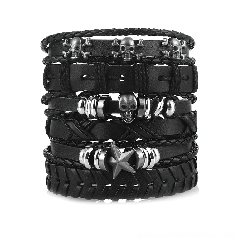 Black gothic leather bracelet set with skull and star designs, six-piece collection displayed flat lay on white background showing braided and rope chain details