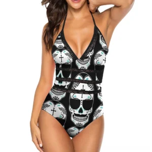 Women's gothic sugar skull one-piece swimsuit with 3D print, front view, black halter deep V-neck with lace trim