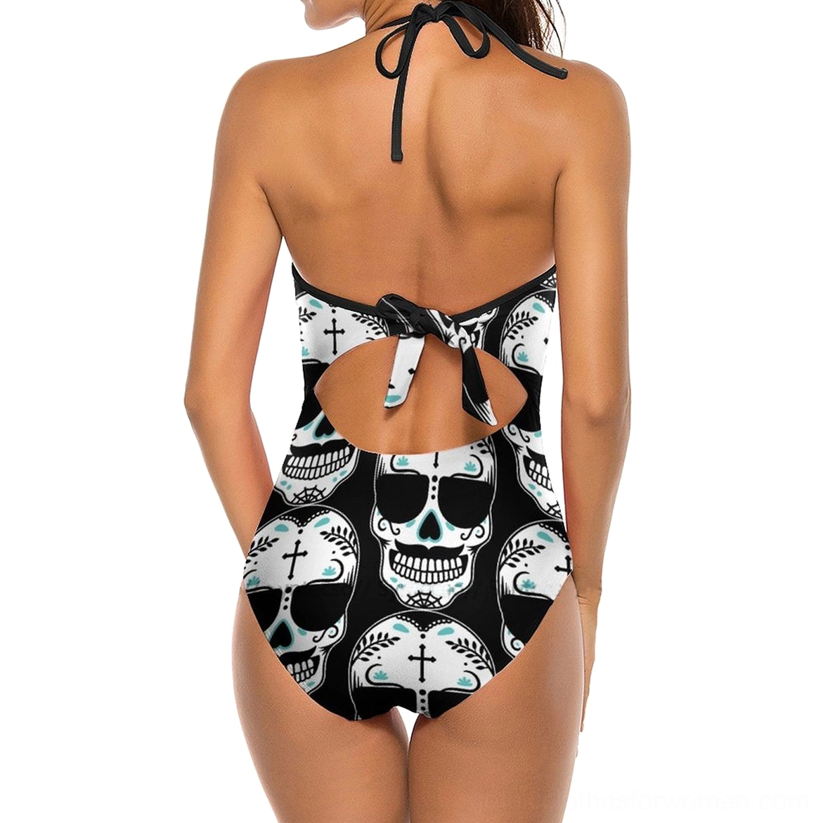 Women's gothic skull one-piece swimsuit, back view showing halter tie closure and decorative bow cutout detail