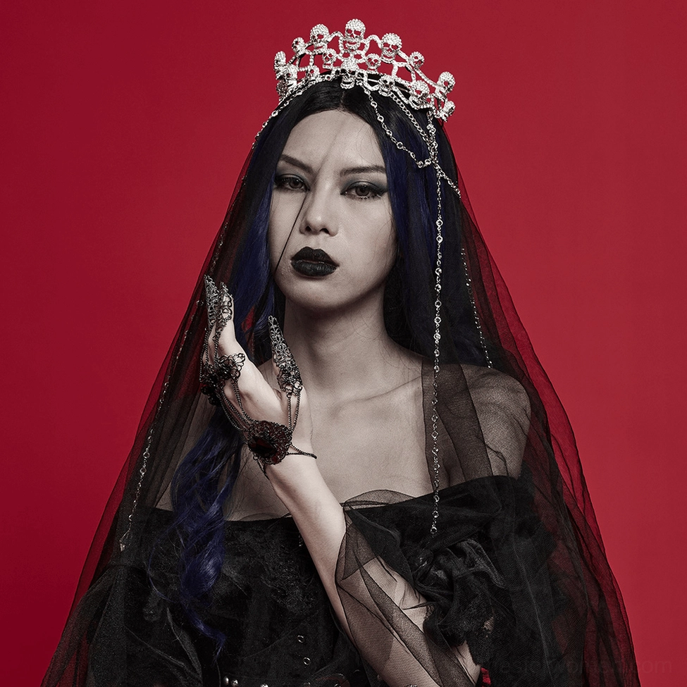 Gothic skull tiara with cascading crystal chains and rhinestone details showcasing complete silhouette and chain work