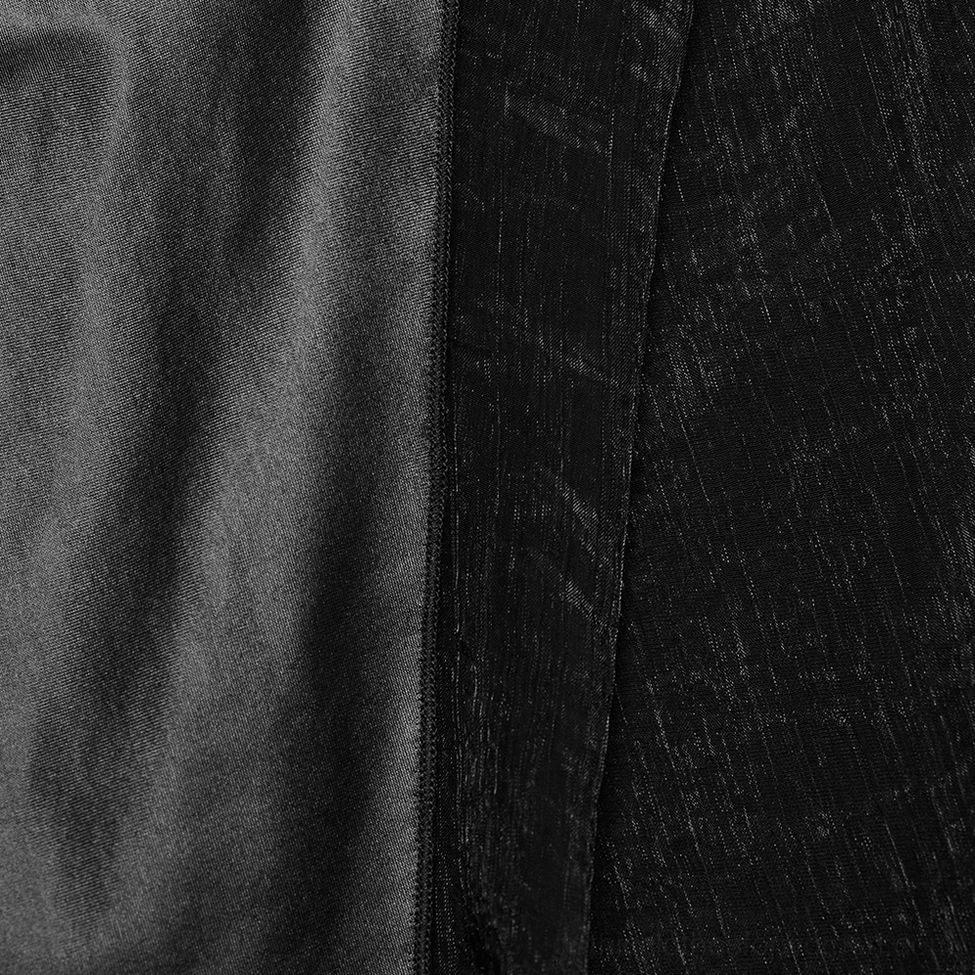 Black gothic maxi slip dress construction detail showing fabric quality and mesh panel integration