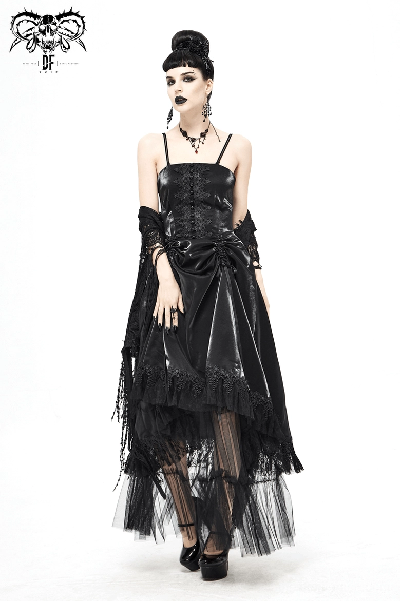Alternative styling of black gothic slip dress with layered tulle hem and decorative lace details