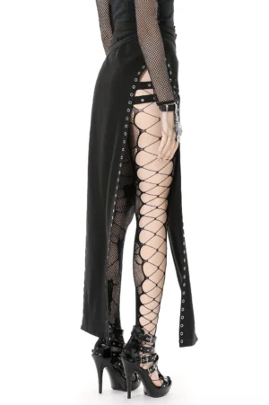 Black asymmetrical slit gothic skirt side profile with fishnet stockings and high slit detail