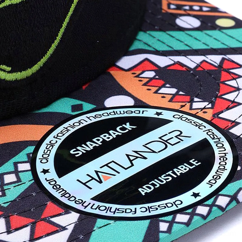 Top view of gothic snapback showing adjustable plastic closure tab and ethnic geometric printed brim detail