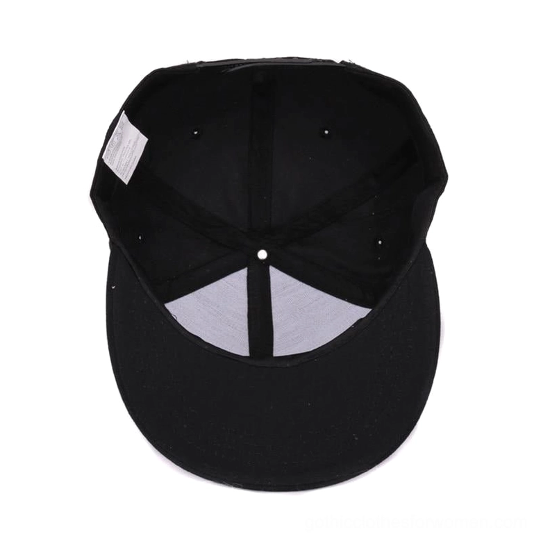 Interior view of gothic skull snapback cap showing size tag and grey underbrim