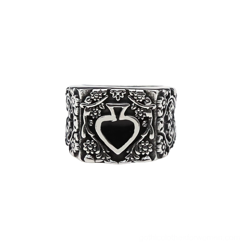 Heart spade gothic ring frontal flat view with floral engraved frame and silver-black color contrast