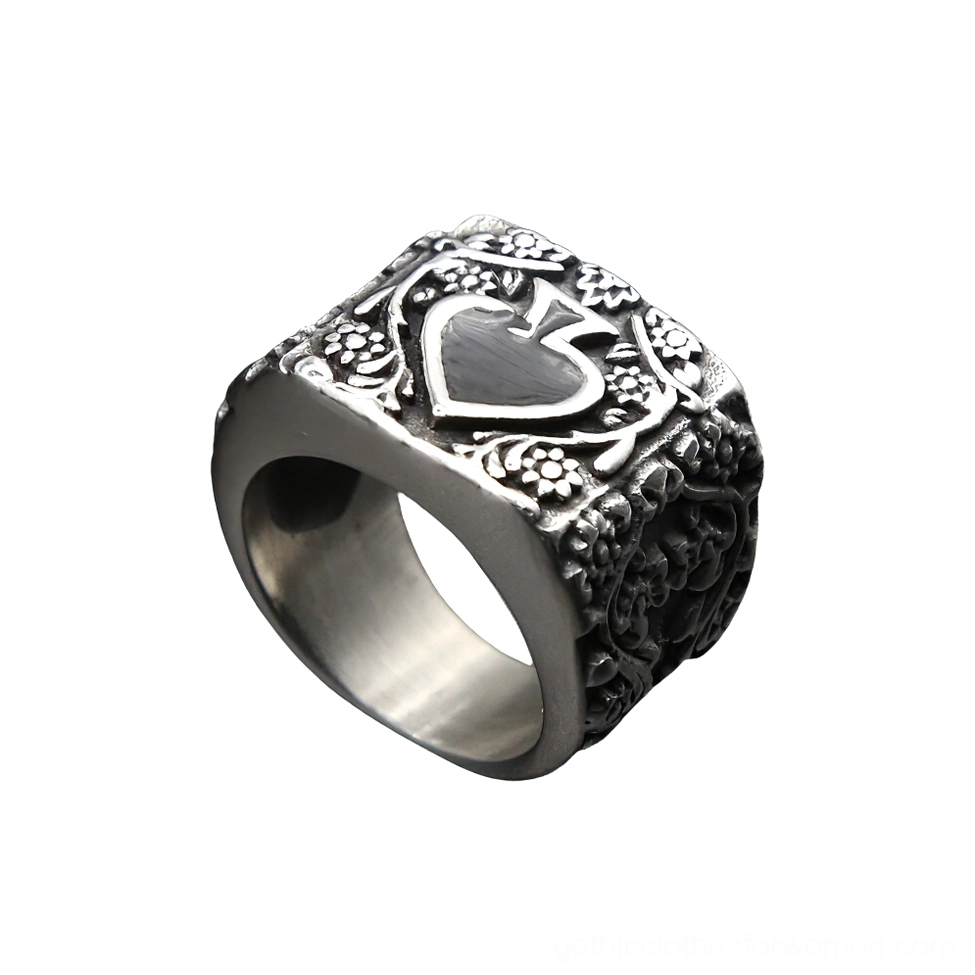 Spade gothic men's ring side view showing brushed silver inner band and embossed floral details