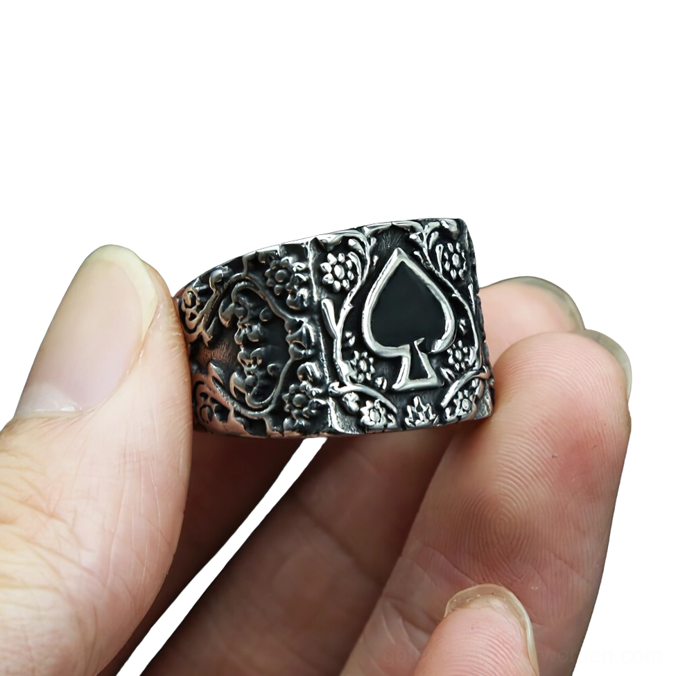 Vintage spade gothic men's ring close-up worn on finger showing aged silver finish and black inlaid spade pattern
