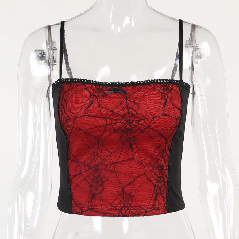 Red and black gothic spider web crop top on display mannequin, front view, patchwork construction with prominent spiderweb print and bow