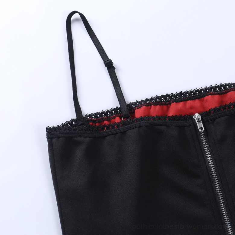 Red and black gothic spider web crop top seam detail, patchwork construction of sleeveless tank with precision stitching