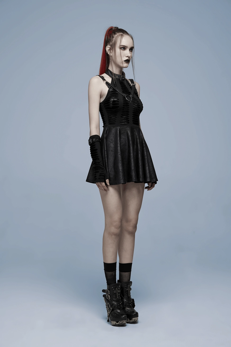 Black gothic spider web mini dress showing shoulder harness loops and adjustable fit features