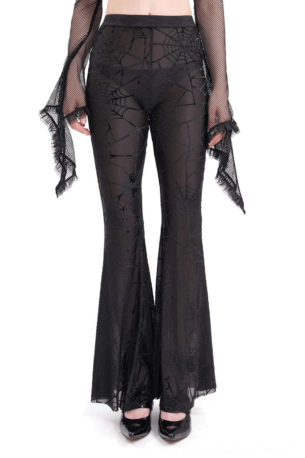 Black sheer spiderweb flare pants front view on model - gothic mesh trousers with high waist and flared hem