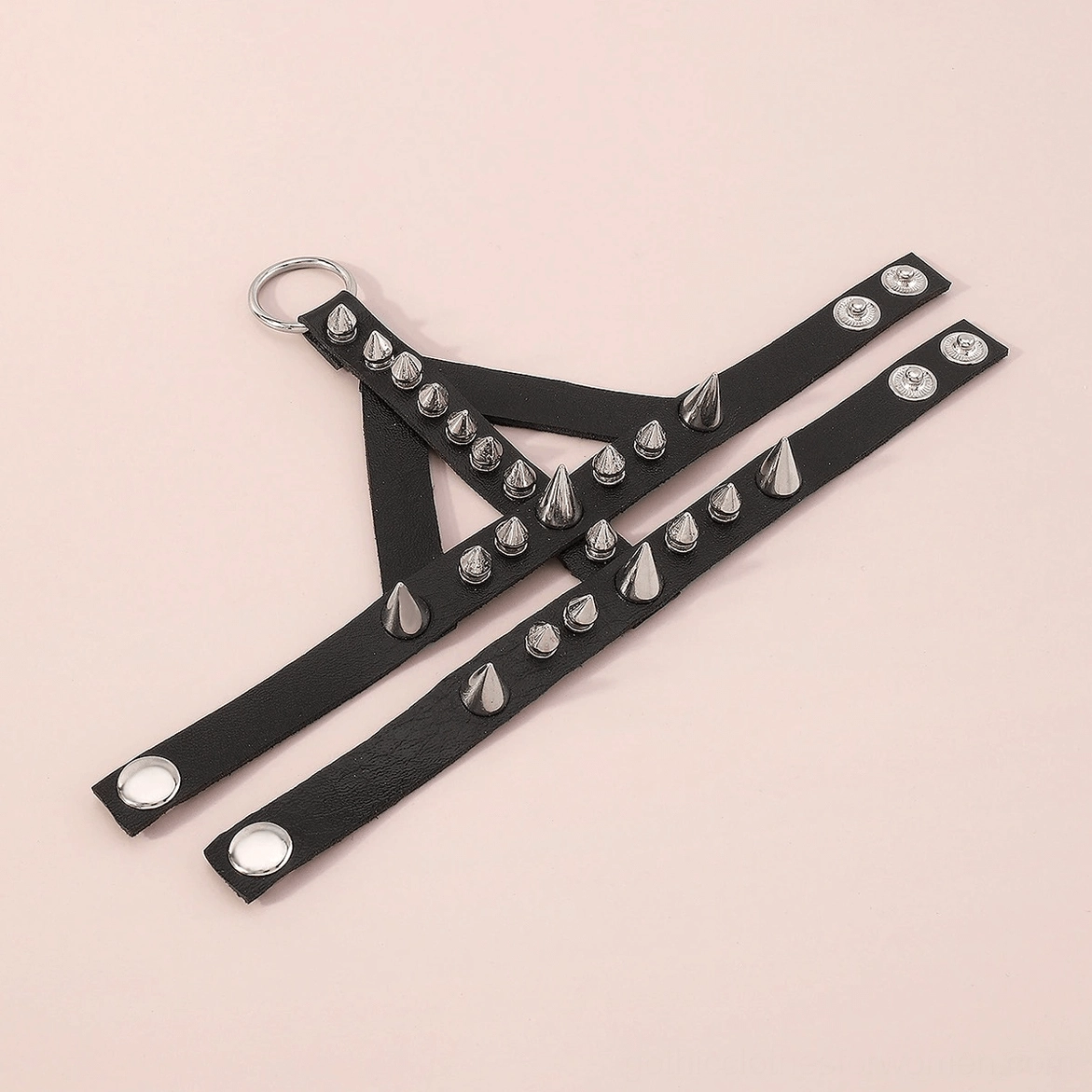 Separated gothic spike bracelet straps showing dual layer construction