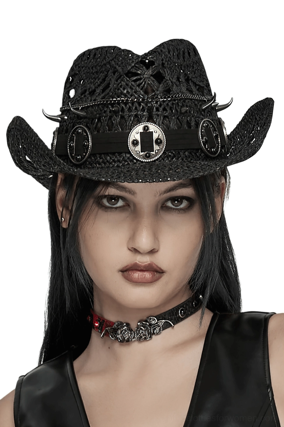 Black gothic spike cowboy hat front view on goth model - straw weave with metal spike trim and dark aesthetic