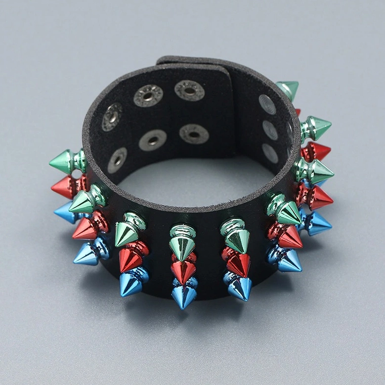Interior view of gothic spike cuff bracelet showing rivet adjustment holes and inside leather surface