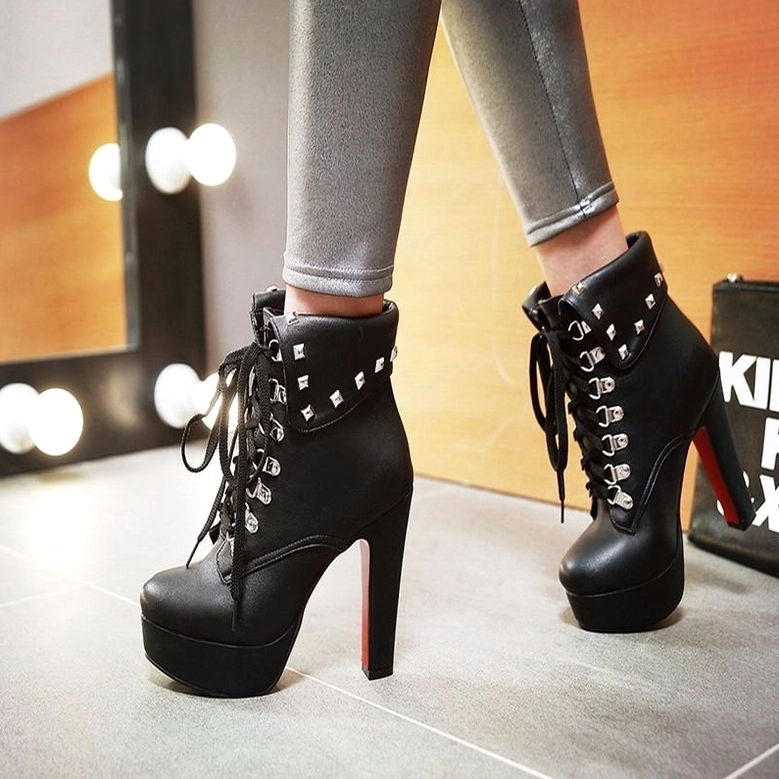 Gothic spike heel boot architectural design detail, demonstrating superior heel stability and platform support for alternative fashion wearers