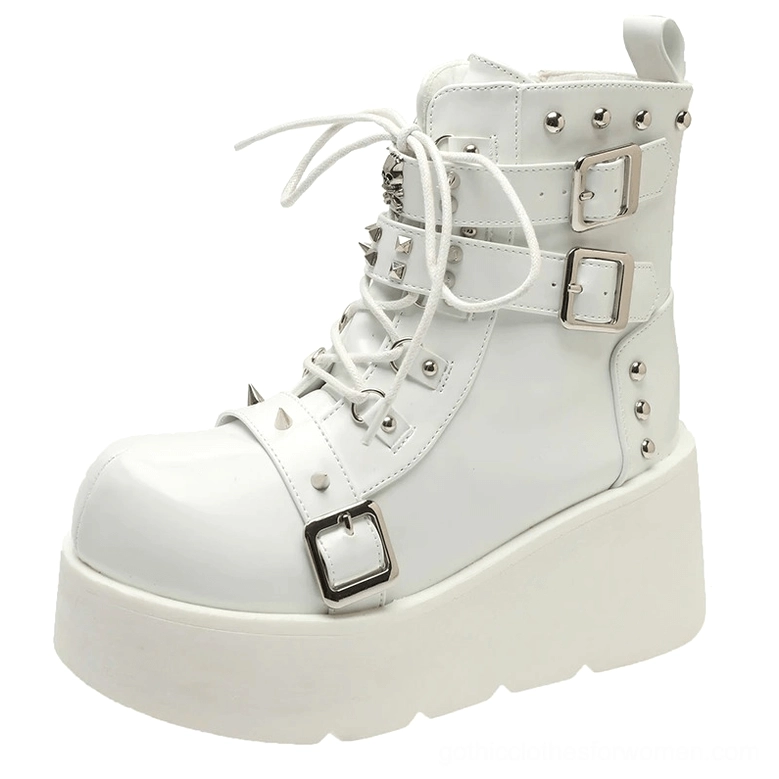 Gothic spiked platform ankle boot in white patent leather with buckles and rivets side view