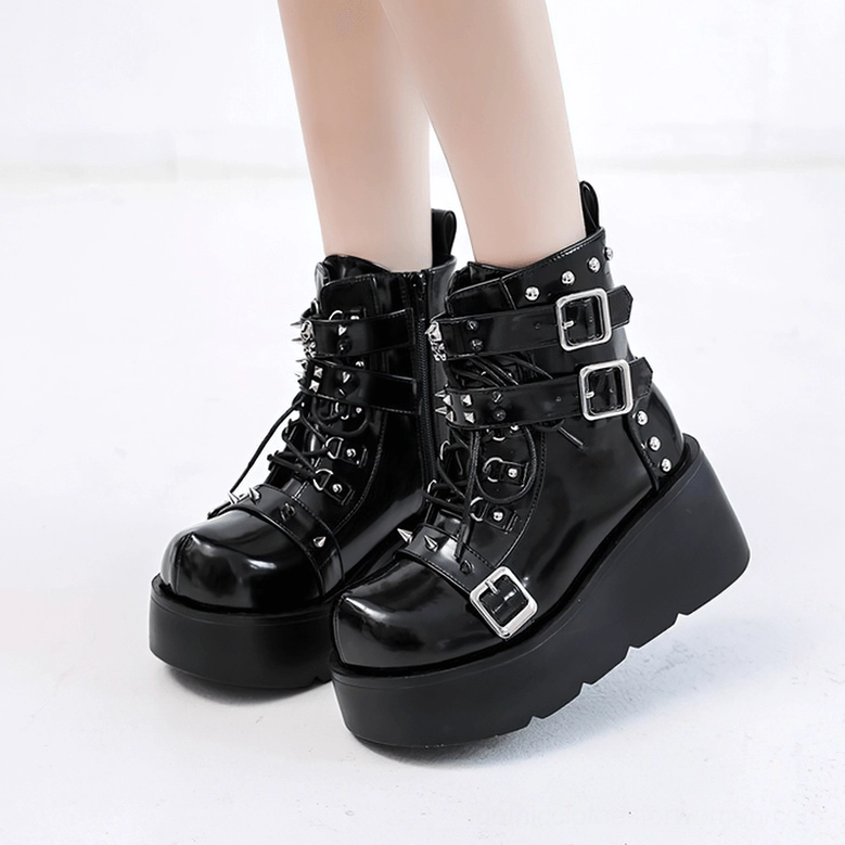 Gothic spiked platform ankle boots for women black patent leather close-up detail