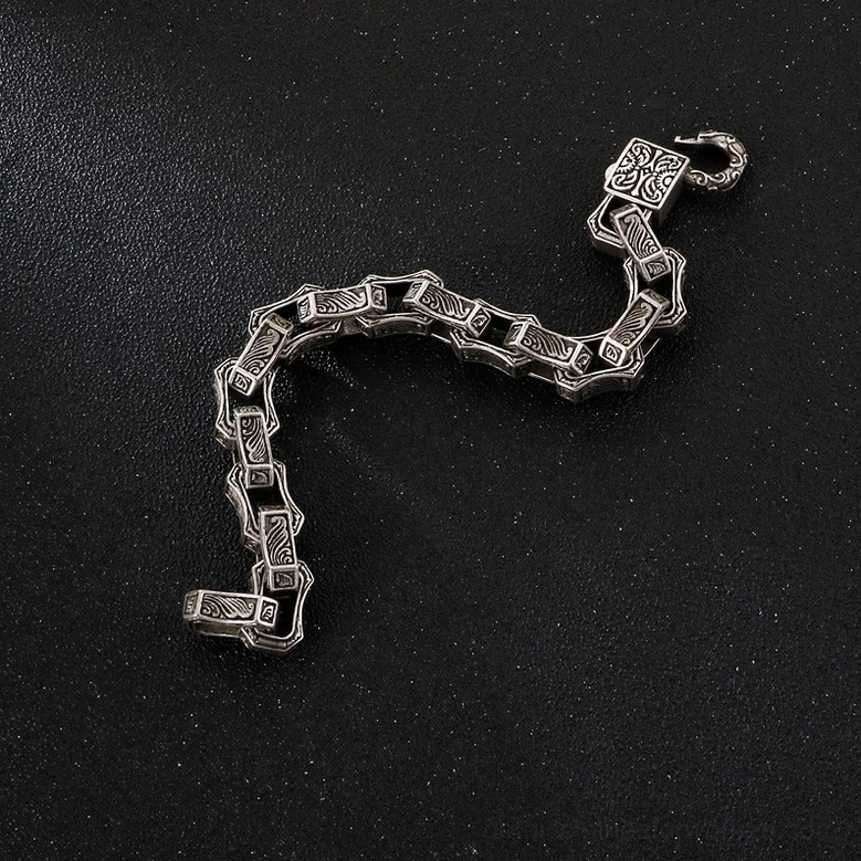 Gothic engraved square link stainless steel bracelet detailed product shot showing craftsmanship