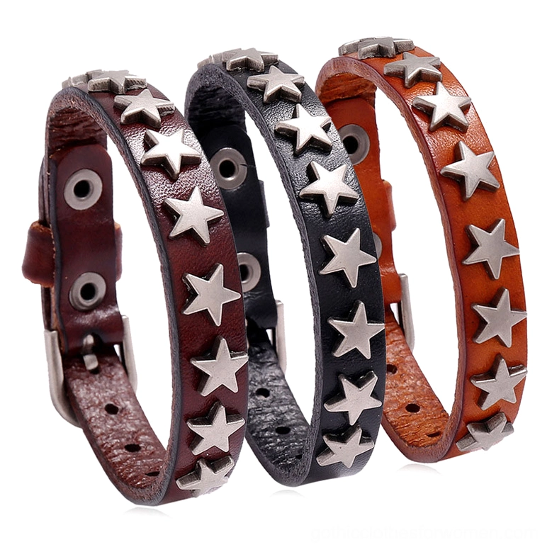 Three gothic star leather bracelets in black, brown, and camel displayed together on white background showing adjustable buckle design