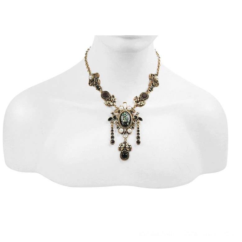 Statement gothic necklace featuring central oval gem and dangling metal charms, front flat mannequin view