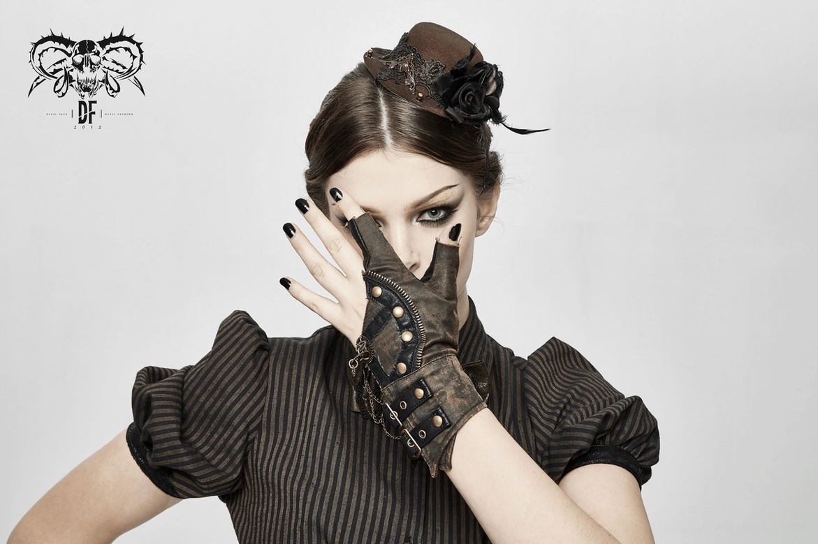 Brown gothic steampunk gloves showing asymmetrical rivet placement and gear charm positioning