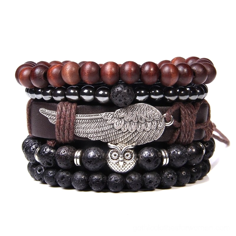 Multi-layered gothic bracelet ensemble with red-brown wooden beads, black stone beads, and ornate owl charm detail
