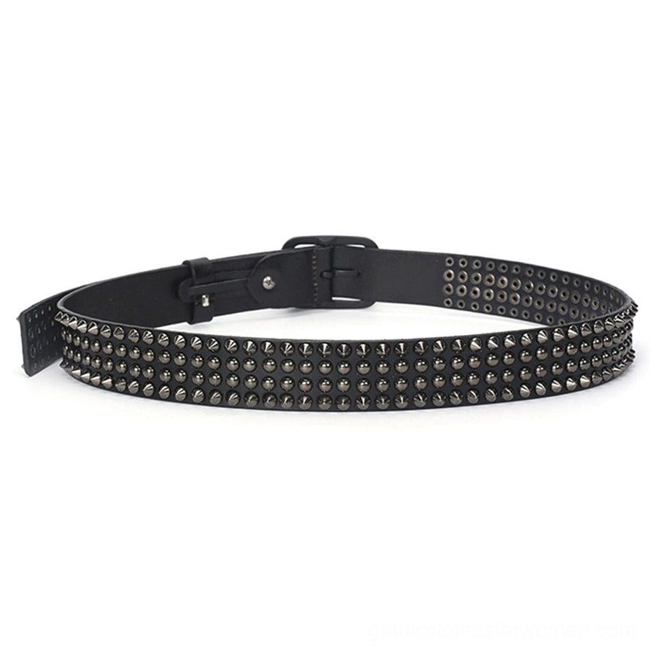 Black studded Gothic belt close-up showing double row cone studs and metal rivet detail