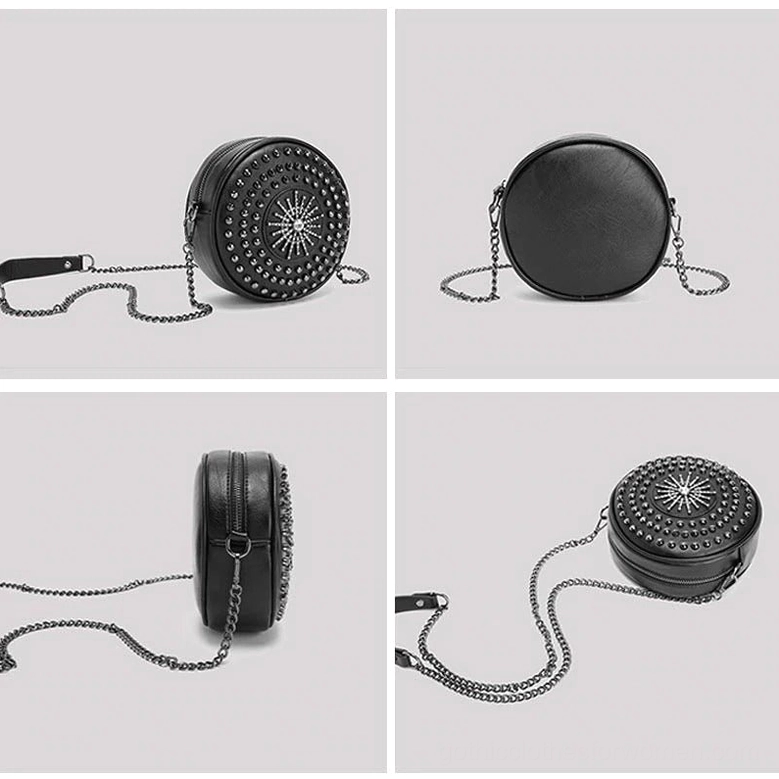 Black gothic mini round bag front view with attached metal chain crossbody strap