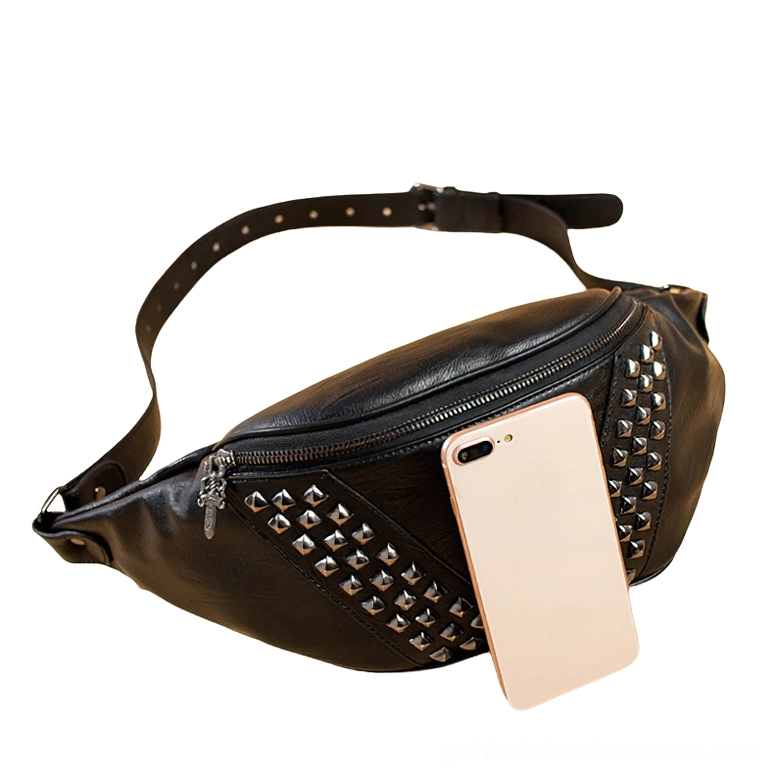 Black gothic studded waist bag side profile displaying pyramid rivets and skull charm with adjustable strap