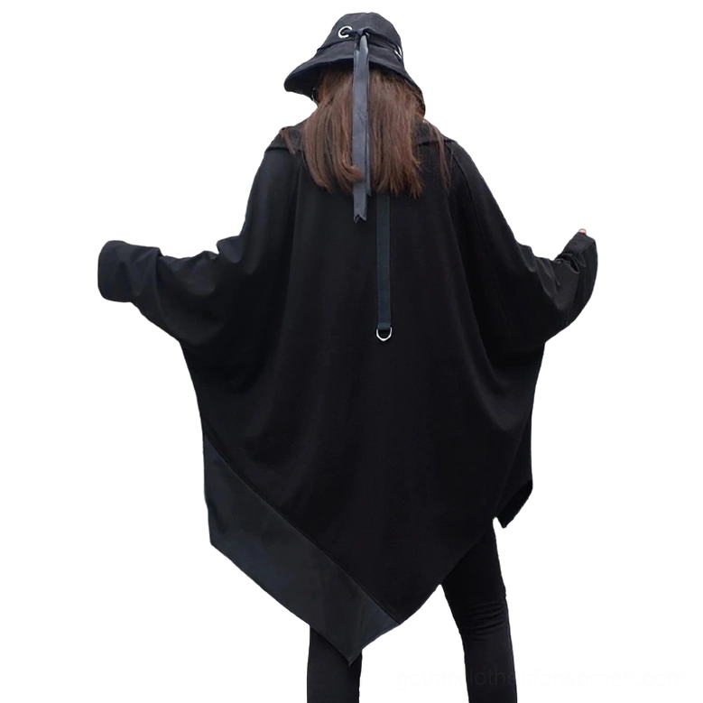 Back view of asymmetrical gothic sweatshirt on model showing uneven satin panel hem and oversized batwing silhouette