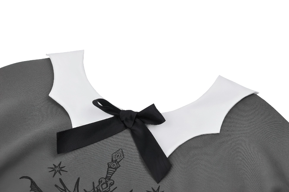 Close-up detail of white peter pan collar and black satin bow on gothic sweatshirt