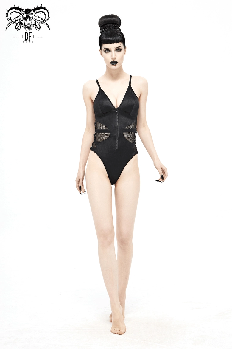 Model walking in black mesh cutout gothic zipper swimsuit showing front zipper closure and spaghetti straps