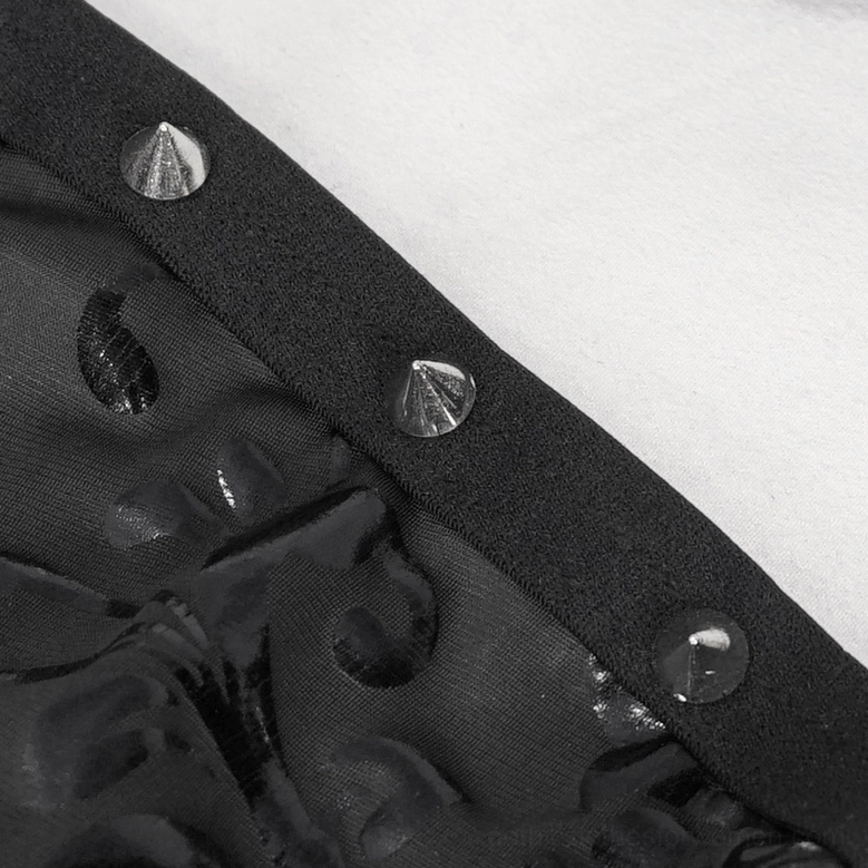 Close-up of single elastic strap with silver cone stud detail on gothic two-piece swimsuit