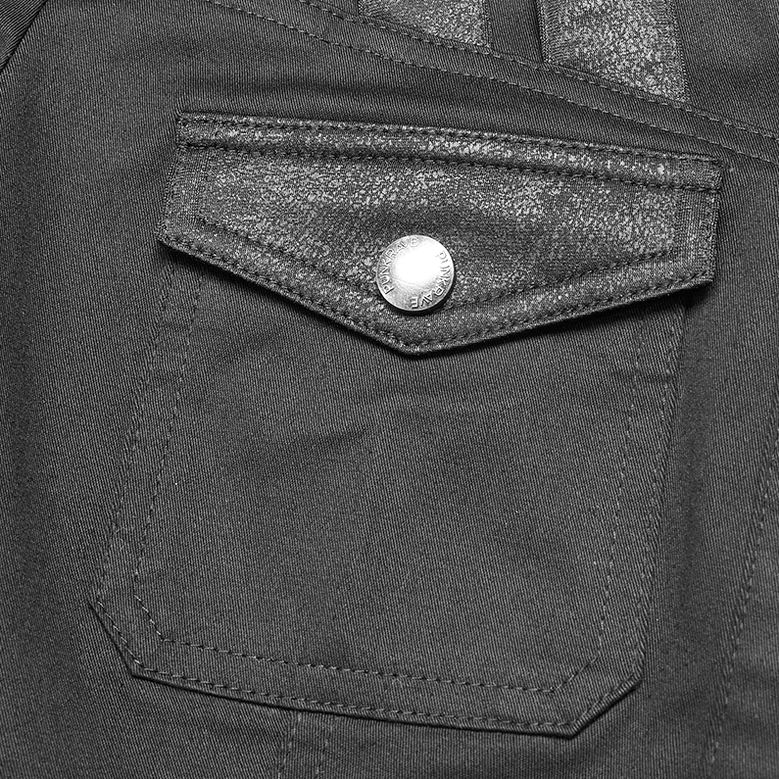 Chest pocket close-up detail on black gothic tactical shirt - flap pocket with round snap button and precision stitching