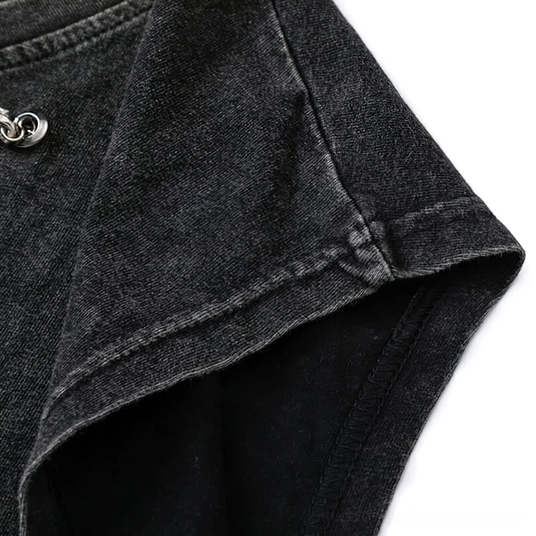 Raw unfinished armhole edge detail on sleeveless gothic tank top showing natural cotton finish