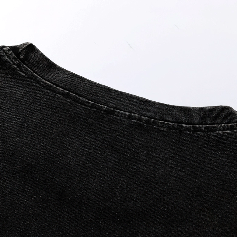 Stitching and seam detail of gothic tank top collar, reinforced construction black washed cotton