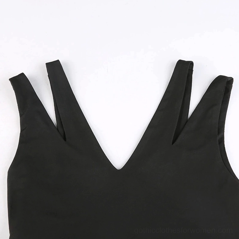 Close-up of dual-layered V-neck strap construction on black gothic tank top - neckline detail view