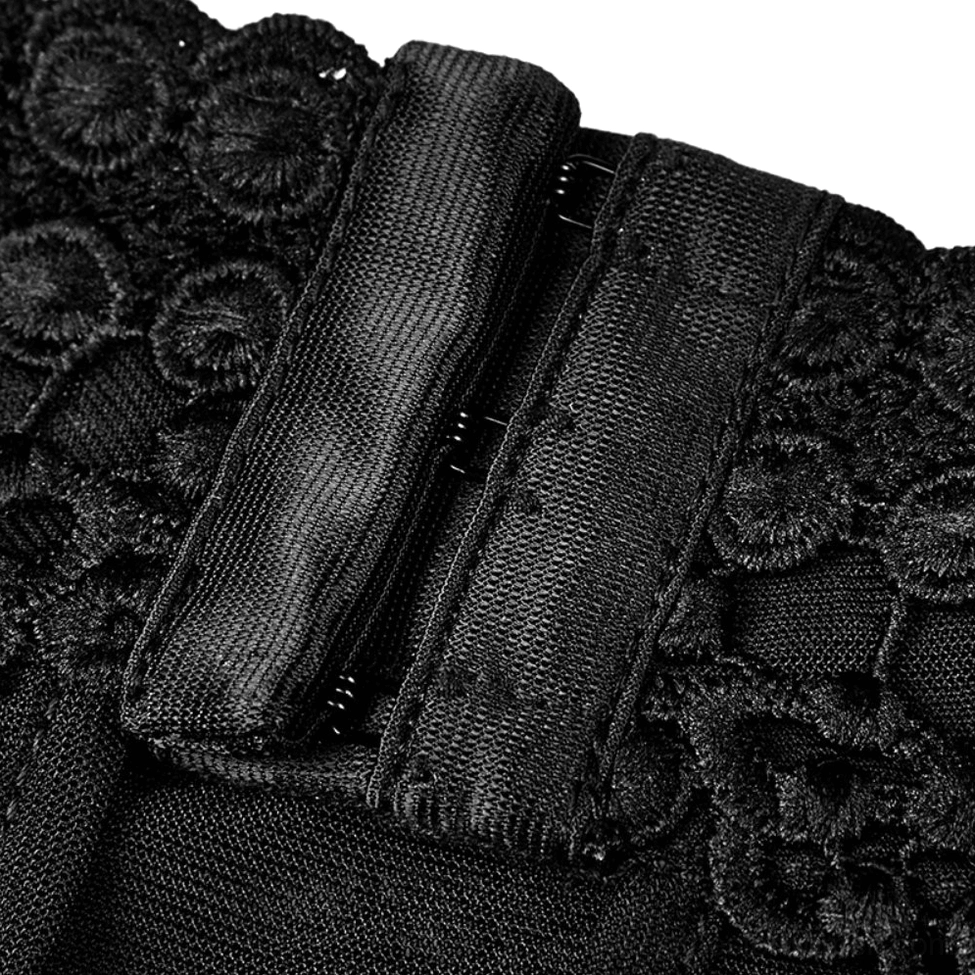 Detailed close-up of hook-and-eye closure fastener with embroidered lace surrounding on gothic tank top