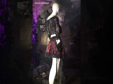 Gothic tartan skirt set on mannequin, back-side view with lace trim and red-black plaid details