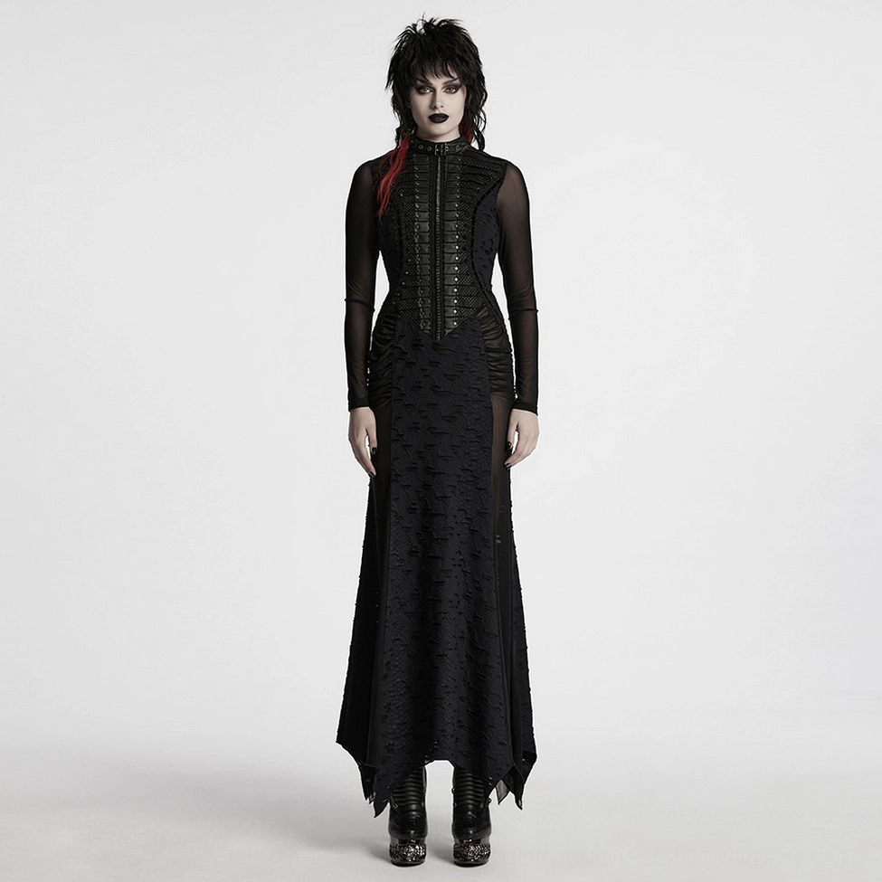 Black gothic dress front styling view on model showing complete silhouette with structured front panels, metal embellishments, sheer mesh elements, and floor-length tattered hem