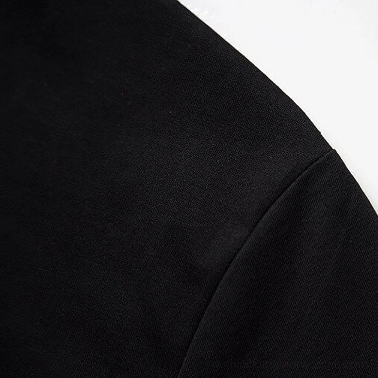 Soft cotton knit fabric texture and reinforced shoulder seam close-up on gothic t-shirt