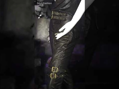 Gothic fashion styling detail - leather pocket with skull rivets and brass snap button hardware