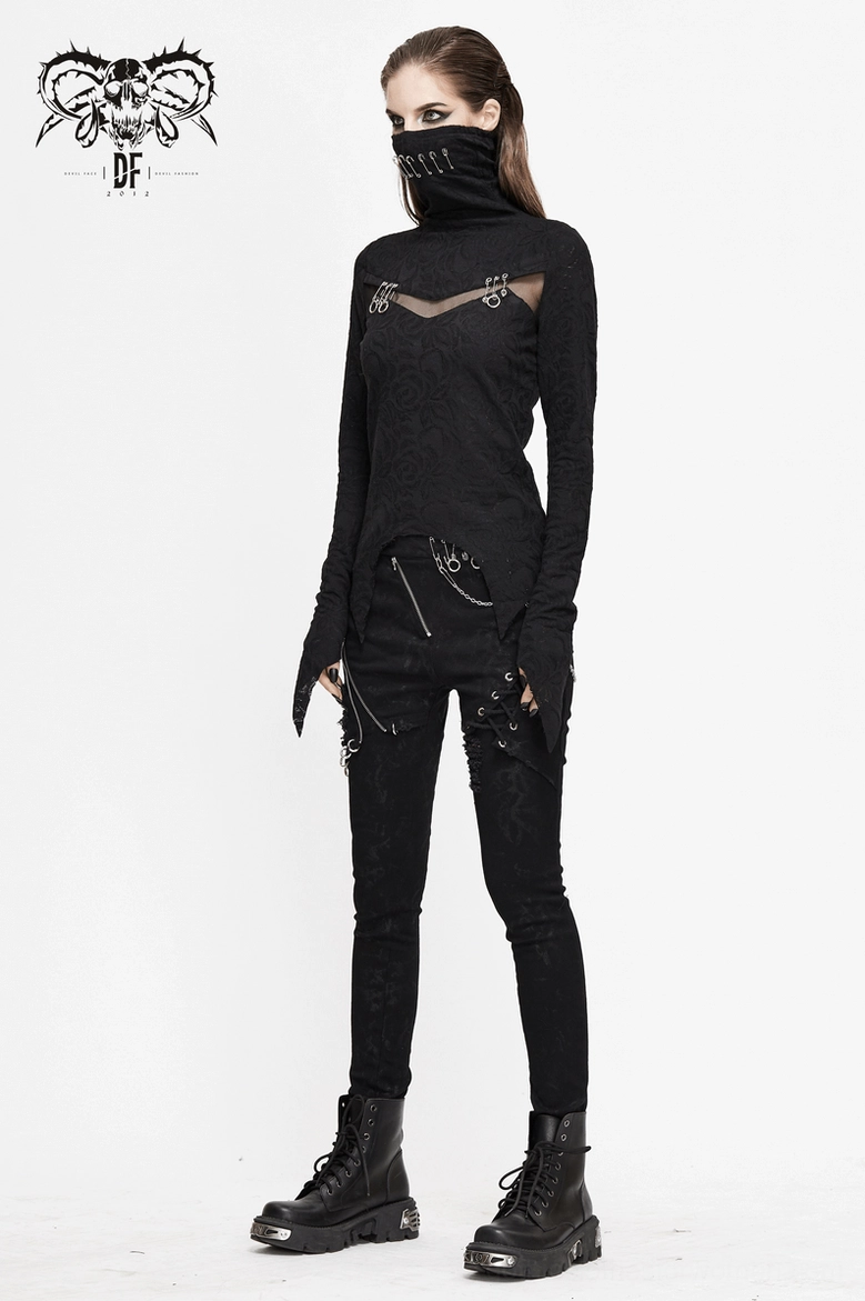 Black gothic long sleeve top with asymmetrical hem worn with chained details and combat boots, back full body