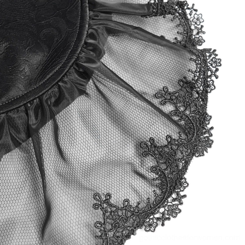 Close-up detail of embroidered lace trim and sheer mesh fabric on gothic bell sleeves