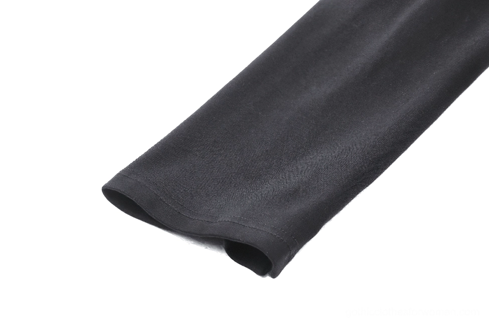 Black long sleeve cuff and soft knit material detail of gothic cutout top