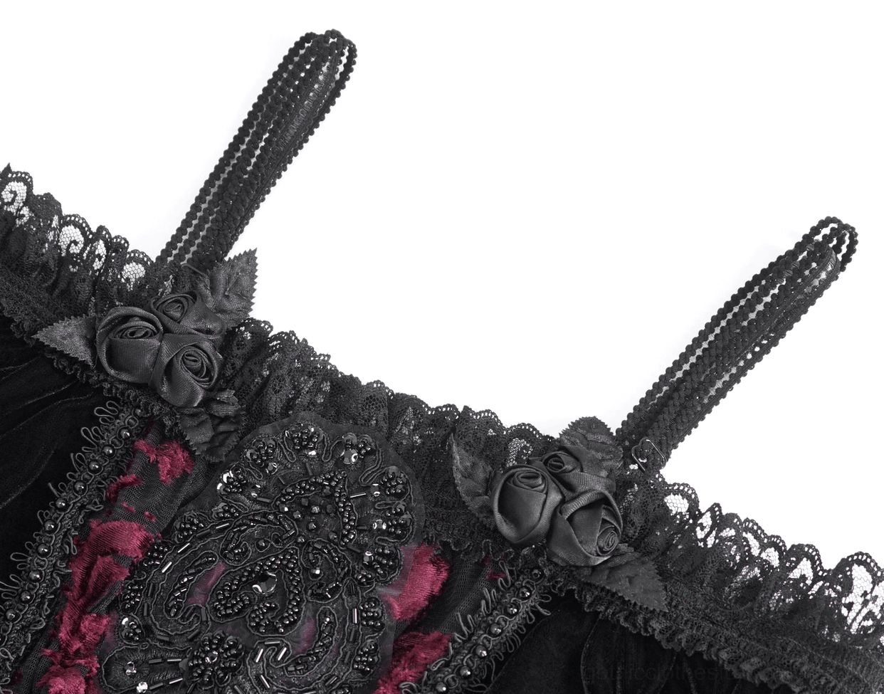Close-up detail of gothic top shoulder featuring rose appliques and beaded burgundy lace embroidery
