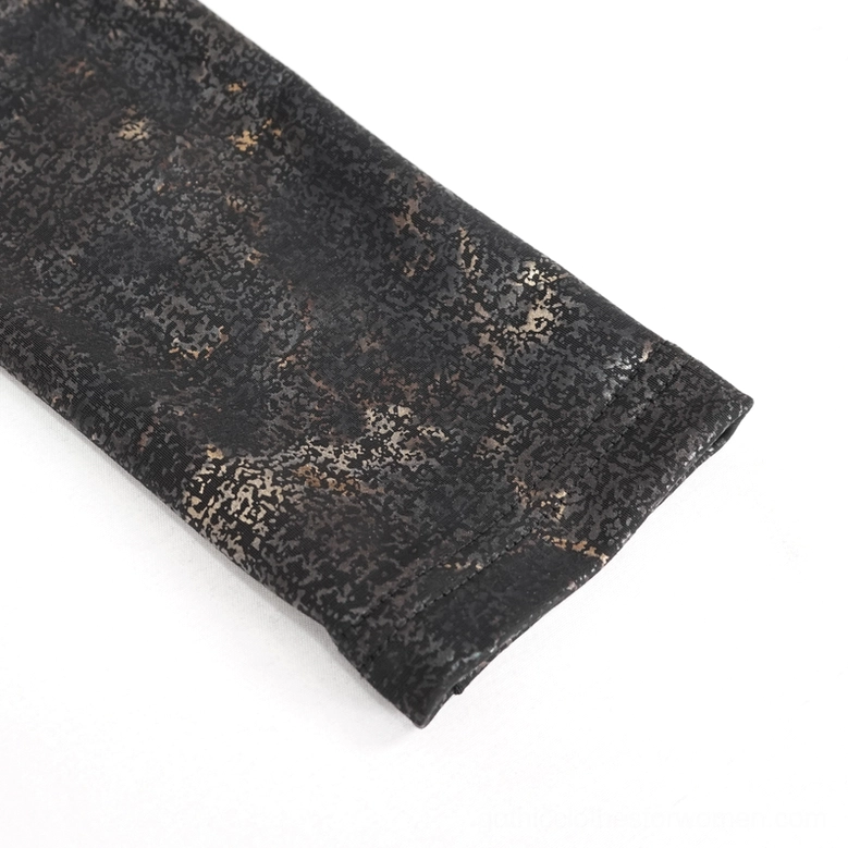 Cuffed sleeve hem detail of black gothic long sleeve top, showing stretch knit material and distressed bronze finish