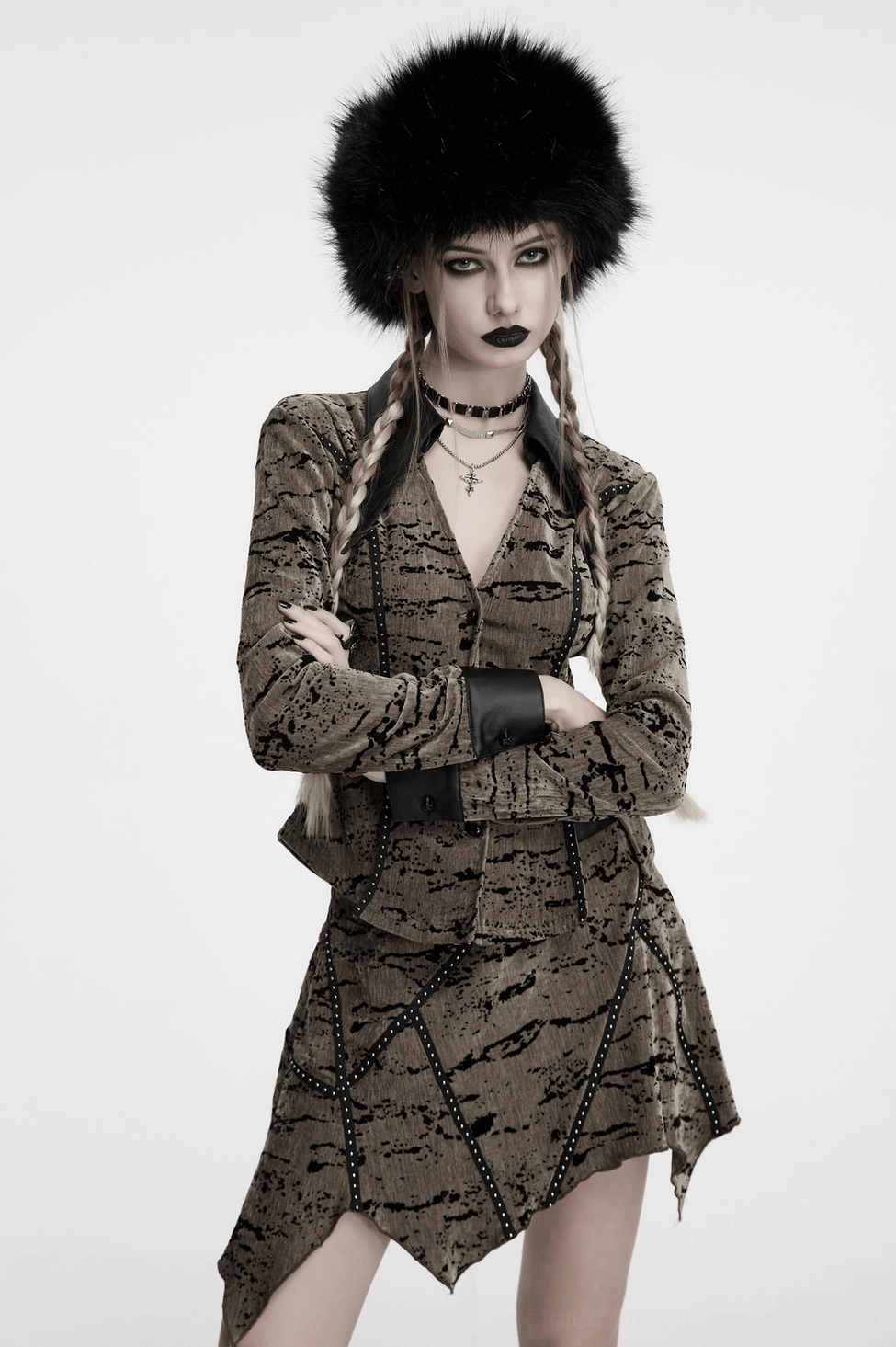Detailed view of gothic plush trapper hat showcasing metal studs, leather straps, and plush construction