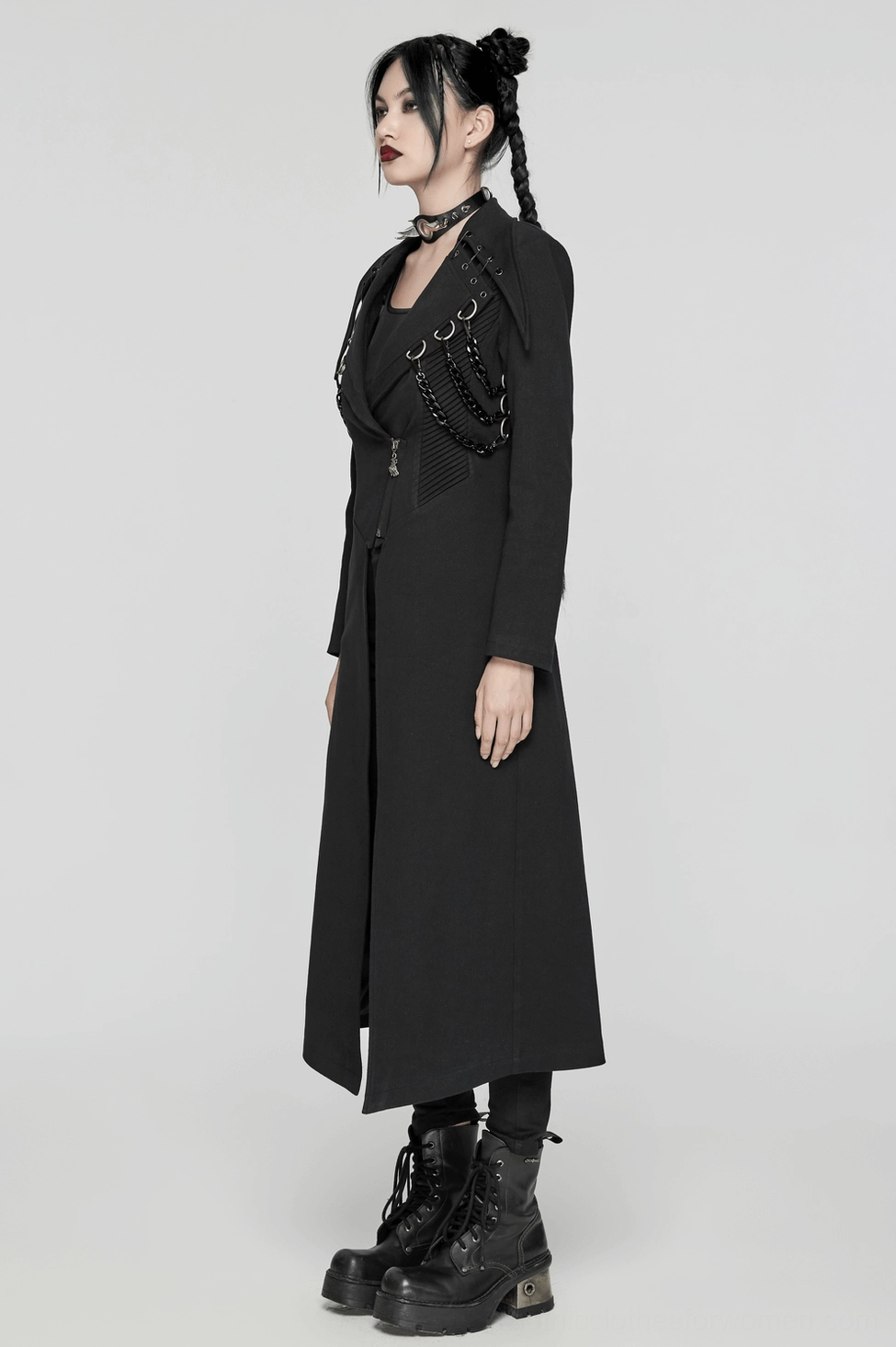 Black gothic trench coat hem and overall silhouette showing structured fit and architectural lines